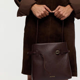 Mini Tote du Jour Deep Brown Calf Skin with a model