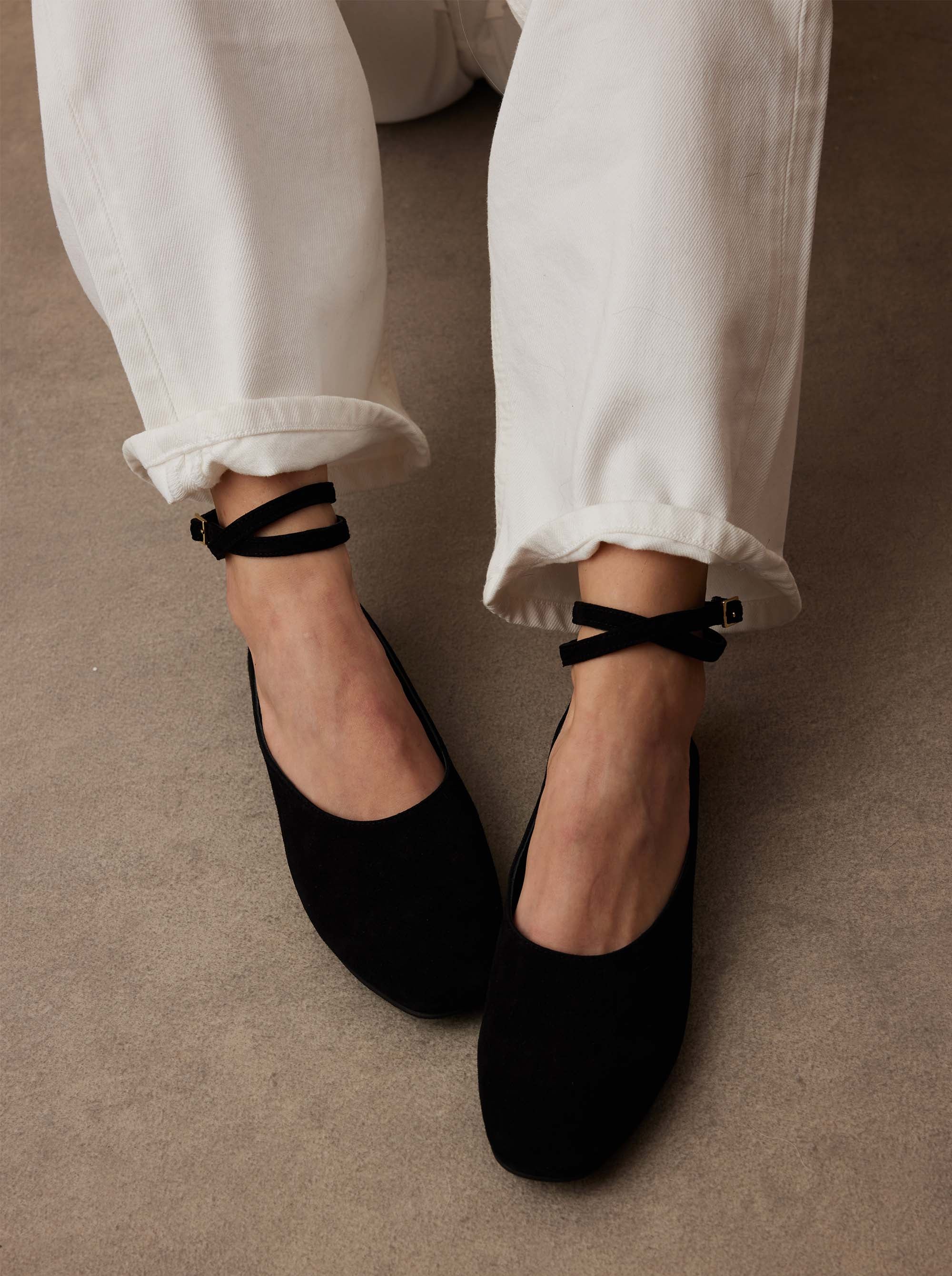 Manu Ballet Flats With Cross Over Ankle Strap Black Suede with a model
